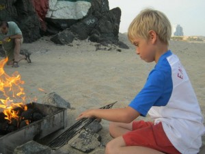 The Boy watching the fire