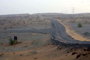 Track leading into the desert and the sun's going down ...