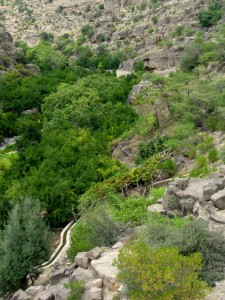 Looking down into the wadi; you can just see the falaj hugging the mountainside