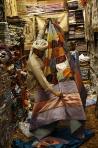 Looking at textiles in the Blue Souk, Sharjah