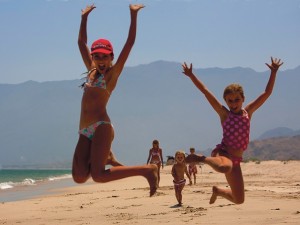 Family walk on the beach