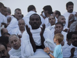 Our Boy joining the throngs going to Mecca, outside the Museum of Islamic Art