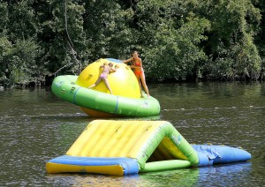 The girls playing on the globe inflatable